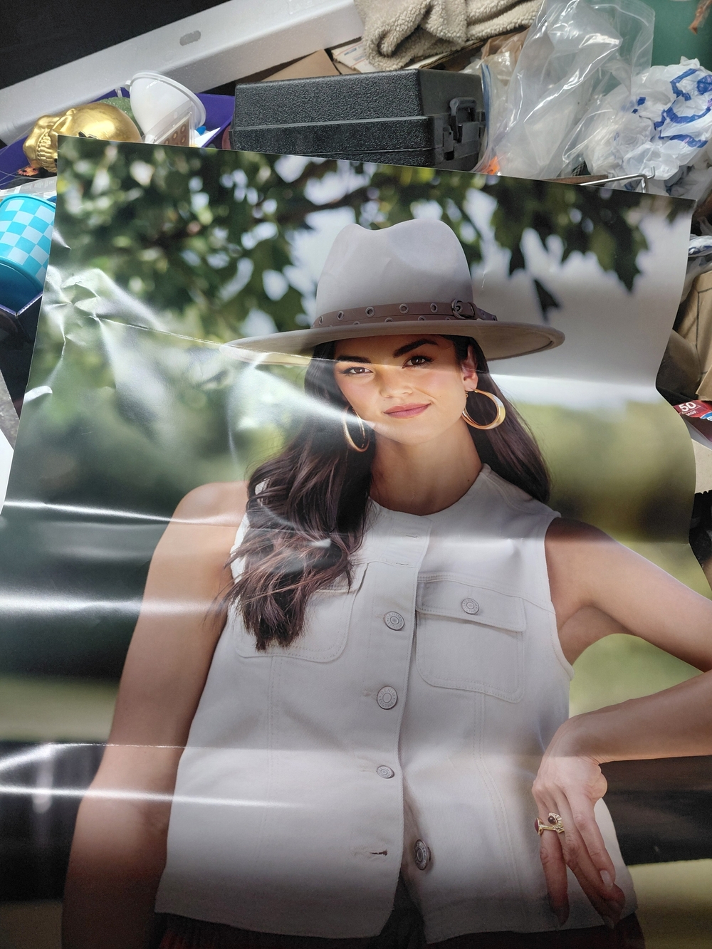 Cato Cream Wide-Brim Fashion Hat Poster with Gold Hoop Earrings